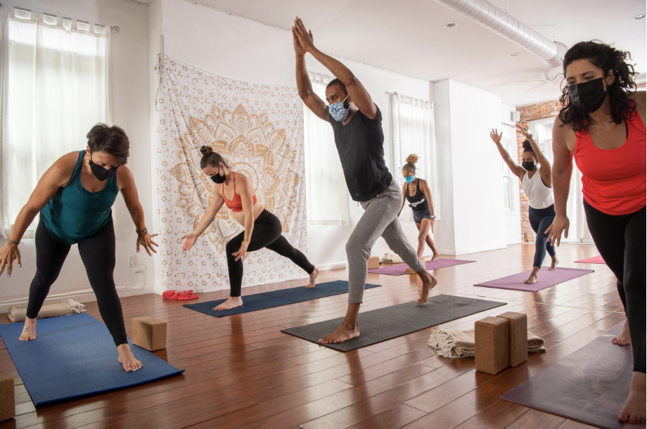 People doing a yoga class